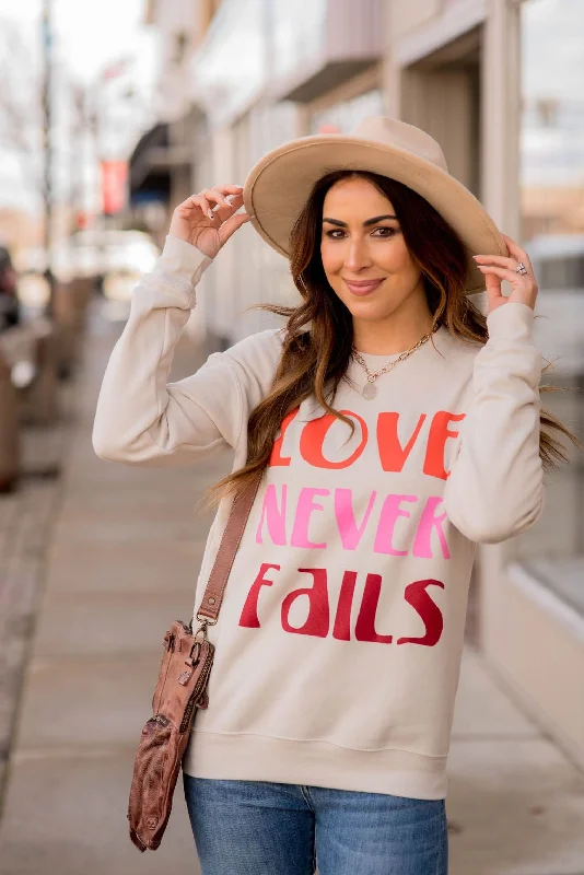 Love Never Fails Graphic Crewneck